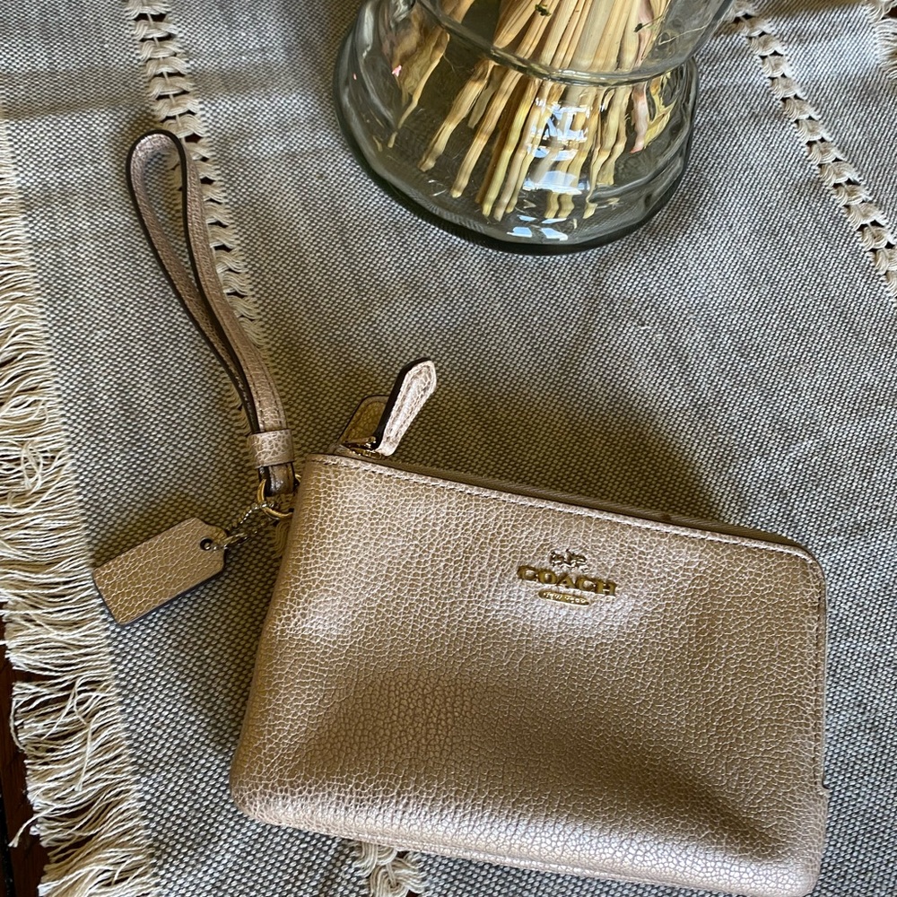 Coach Rose Gold wristlet. Great condition!